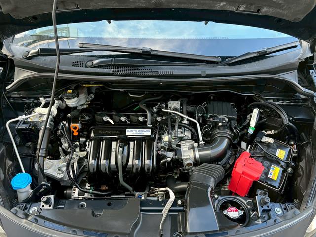 フィット ベーシック　ＡＣＣフルセグナビＥＴＣハロゲンヘッドＲカメラナビ連動前後ドラレコサイドカーテンエアバッグ電制ＰオートブレーキホールドＢＴミュージックラックＣＤＤＶＤ再生ＵＳＢスマキー（24枚目）