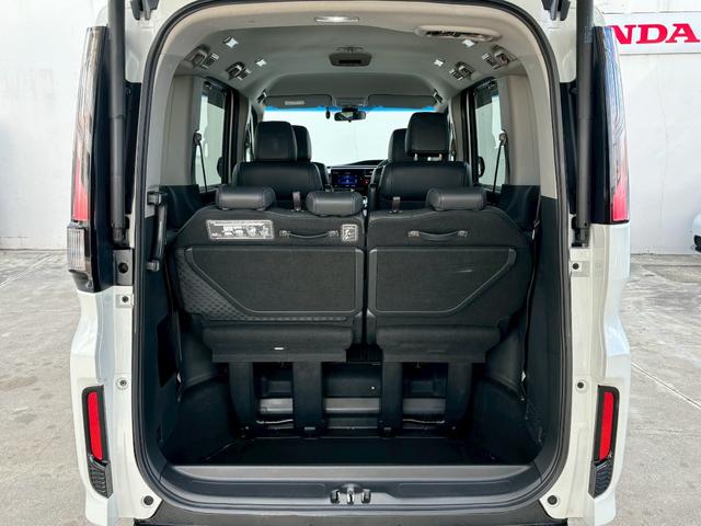 ステップワゴンスパーダ ｅ：ＨＥＶスパーダＧ・ＥＸホンダセンシング　ＡＣＣフルセグナビＬＥＤヘッドフォグＲカメラＥＴＣナビ連動ドラレコ両側パワスラ電制Ｐオートブレーキホールド純正アルミＢＴミュージックラックＣＤＤＶＤ再生トリプルゾーンエアコン（11枚目）