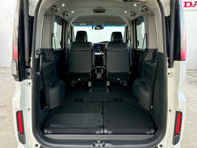 ステップワゴンスパーダ ｅ：ＨＥＶスパーダＧ・ＥＸホンダセンシング　ＡＣＣフルセグナビＬＥＤヘッドフォグＲカメラＥＴＣナビ連動ドラレコ両側パワスラ電制Ｐオートブレーキホールド純正アルミＢＴミュージックラックＣＤＤＶＤ再生トリプルゾーンエアコン（12枚目）