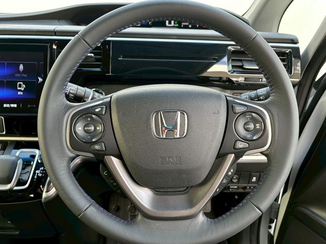 ステップワゴンスパーダ ｅ：ＨＥＶスパーダＧ・ＥＸホンダセンシング　ＡＣＣフルセグナビＬＥＤヘッドフォグＲカメラＥＴＣナビ連動ドラレコ両側パワスラ電制Ｐオートブレーキホールド純正アルミＢＴミュージックラックＣＤＤＶＤ再生トリプルゾーンエアコン（24枚目）