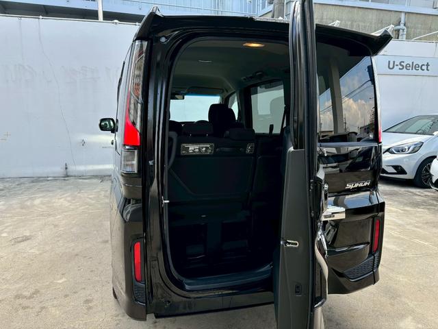 ステップワゴンスパーダ スパーダホンダセンシング ACCフルセグナビLEDヘッドフォグRカメラETCオートエアコンリアマニュアルクーラー両側パワスラBTミュージックラックCDDVD再生USBパドルシフト本革巻きシートバックテーブル純正アルミスマキー(10枚目)