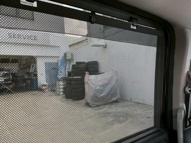 ステップワゴンスパーダ スパーダホンダセンシング ACCフルセグナビLEDヘッドフォグRカメラETCオートエアコンリアマニュアルクーラー両側パワスラBTミュージックラックCDDVD再生USBパドルシフト本革巻きシートバックテーブル純正アルミスマキー(13枚目)