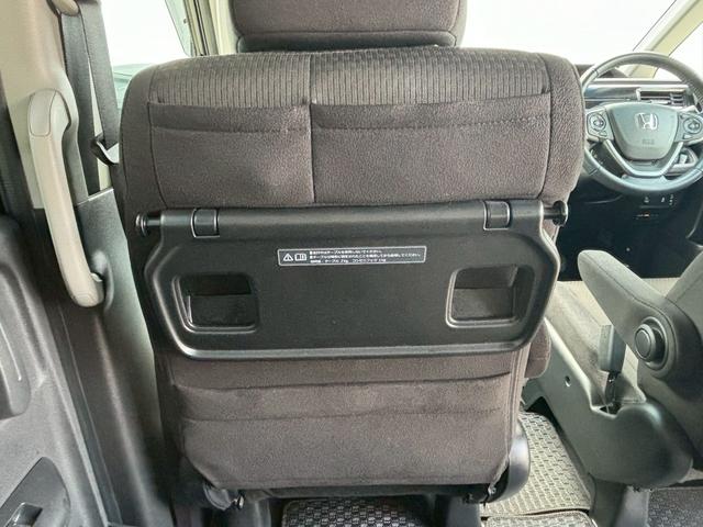 ステップワゴンスパーダ スパーダホンダセンシング ACCフルセグナビLEDヘッドフォグRカメラETCオートエアコンリアマニュアルクーラー両側パワスラBTミュージックラックCDDVD再生USBパドルシフト本革巻きシートバックテーブル純正アルミスマキー(15枚目)