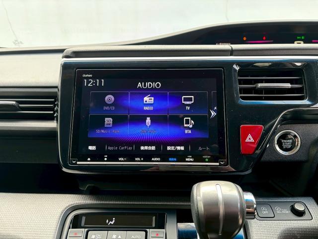 ステップワゴンスパーダ スパーダホンダセンシング ACCフルセグナビLEDヘッドフォグRカメラETCオートエアコンリアマニュアルクーラー両側パワスラBTミュージックラックCDDVD再生USBパドルシフト本革巻きシートバックテーブル純正アルミスマキー(17枚目)