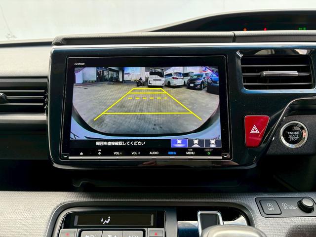 ステップワゴンスパーダ スパーダホンダセンシング ACCフルセグナビLEDヘッドフォグRカメラETCオートエアコンリアマニュアルクーラー両側パワスラBTミュージックラックCDDVD再生USBパドルシフト本革巻きシートバックテーブル純正アルミスマキー(18枚目)