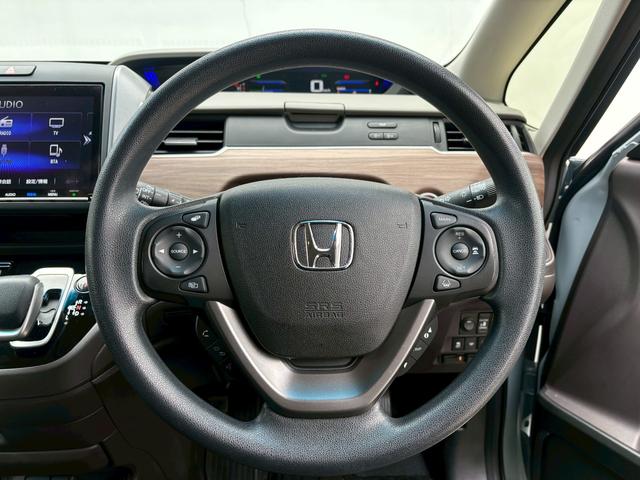 フリードハイブリッド ハイブリッド・Ｇ　ＡＣＣフルセグナビＬＥＤヘッドＲカメラ両側パワスラＥＴＣ前後ドラレコ運転席助手席シートヒーターＢＴミュージックラックＣＤＤＶＤ再生ＵＳＢスマキー（19枚目）