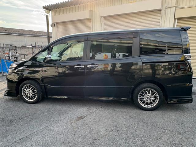 ヴォクシー ハイブリッドＺＳ　煌ＩＩ　モデリスタエアロ・両側パワースライドドア・クルーズコントロール・レーンキープアシスト・Ｂｌｕｅｔｏｏｔｈ対応ナビ・ＥＴＣ・ドライブレコーダー・バックカメラ・純正１６インチアルミホイール・シートヒーター（12枚目）