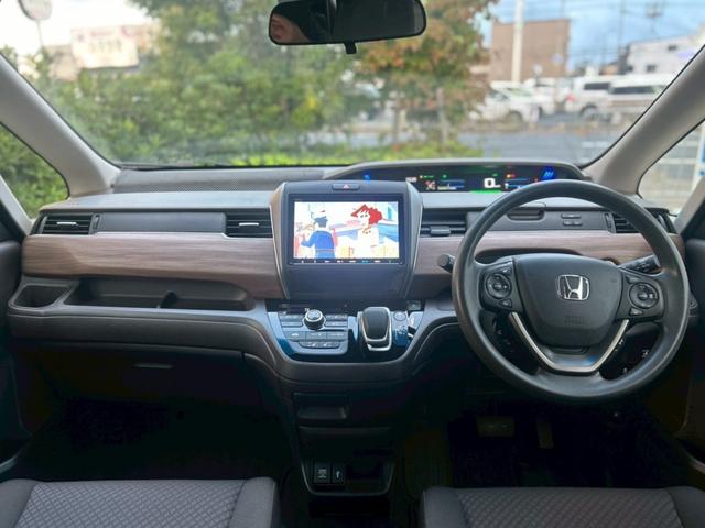 フリードハイブリッド ハイブリッド・Gホンダセンシング 禁煙 純正ナビ/VXM-217VFNi フルセグテレビ バックカメラ シートヒーター 両側パワースライドドア ETC レーダークルーズ レーンキープ 衝突軽減システム スマートキー(5枚目)