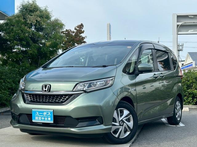 フリードハイブリッド ハイブリッド・Gホンダセンシング 禁煙 純正ナビ/VXM-217VFNi フルセグテレビ バックカメラ シートヒーター 両側パワースライドドア ETC レーダークルーズ レーンキープ 衝突軽減システム スマートキー(8枚目)
