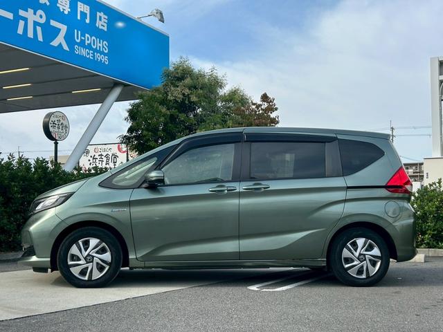 フリードハイブリッド ハイブリッド・Gホンダセンシング 禁煙 純正ナビ/VXM-217VFNi フルセグテレビ バックカメラ シートヒーター 両側パワースライドドア ETC レーダークルーズ レーンキープ 衝突軽減システム スマートキー(11枚目)
