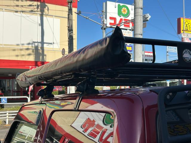 ジムニー クロスアドベンチャーＸＣ　ユーザー買取禁煙カロッツリアナビフルセグ地デジＴＶＥＴＣＲカメラオーニングルーフキャリアＤ席レカロシート（純正有）リフトアップラダーオーニング外マフラー外ＬＥＤ（ヘッドフォグテール）デイライトツイータ（7枚目）