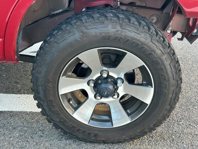 ジムニー クロスアドベンチャーＸＣ　ユーザー買取禁煙カロッツリアナビフルセグ地デジＴＶＥＴＣＲカメラオーニングルーフキャリアＤ席レカロシート（純正有）リフトアップラダーオーニング外マフラー外ＬＥＤ（ヘッドフォグテール）デイライトツイータ（10枚目）