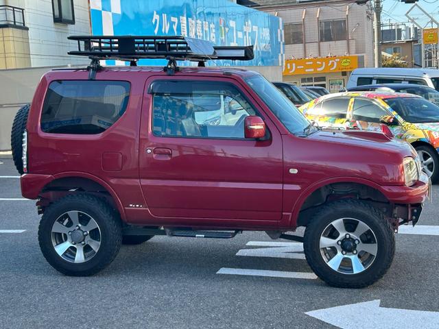 ジムニー クロスアドベンチャーＸＣ　ユーザー買取禁煙カロッツリアナビフルセグ地デジＴＶＥＴＣＲカメラオーニングルーフキャリアＤ席レカロシート（純正有）リフトアップラダーオーニング外マフラー外ＬＥＤ（ヘッドフォグテール）デイライトツイータ（15枚目）