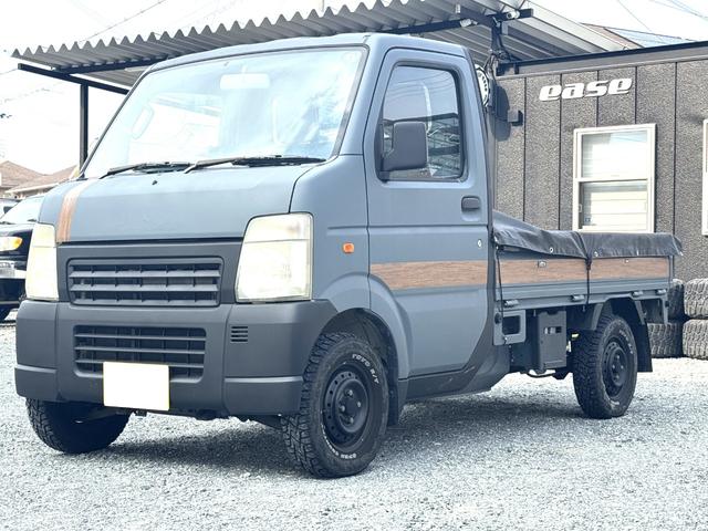 キャリイトラック KCエアコン・パワステ パートタイム4WD エアコン パワステ シートカバー オープンカントリーR/Tタイヤ ETC(5枚目)