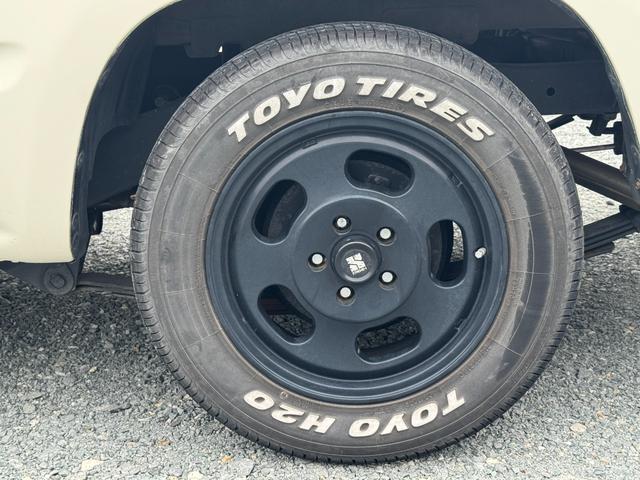 ハイラックス ＤＸ　ＲＺＮ１４７　ＮＯｘ・ＰＭ適合　ローダウン　ＴＯＹＯ　Ｈ２Ｏホワイトレタータイヤ　ＭＬＪ　Ｄ：ＳＬＯＴ１６インチアルミＪＷＬ－Ｔ　社外サイド出しマフラー　シートカバー　ＵＳステップバンパー（15枚目）