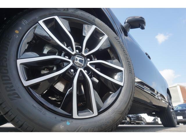 ヴェゼル ｅ：ＨＥＶ　Ｚ　登録済未使用　ホンダセンシング　パワーバックドア　ハーフレザーシート　バックカメラ　クルーズコントロール　ＬＥＤヘッドライト　ステアリングヒーター　シートヒーター　オートエアコン　禁煙車（66枚目）