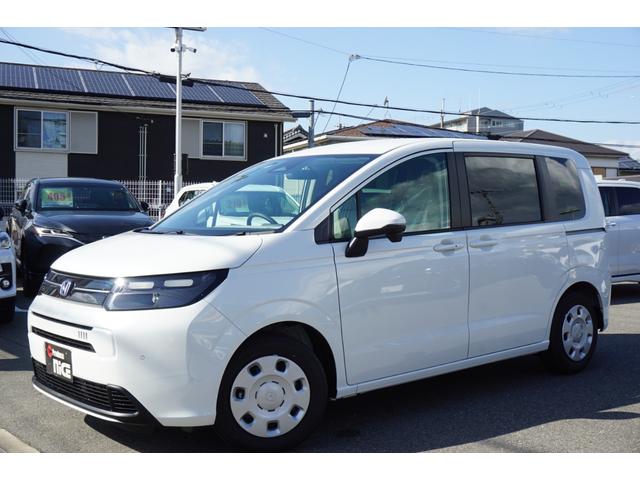 フリード ｅ：ＨＥＶエアー　登録済未使用車　レーダークルーズコントロール　両側パワースライドドア　ＬＥＤヘッドライト　横滑り防止装置　ブレーキホールド　電子パーキングブレーキ　衝突軽減ブレーキ　オートエアコン（5枚目）