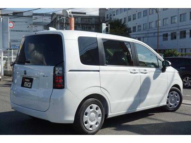 フリード ｅ：ＨＥＶエアー　登録済未使用車　レーダークルーズコントロール　両側パワースライドドア　ＬＥＤヘッドライト　横滑り防止装置　ブレーキホールド　電子パーキングブレーキ　衝突軽減ブレーキ　オートエアコン（76枚目）