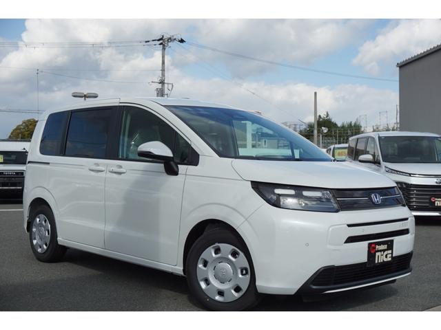 フリード e:HEVエアー 登録済未使用車 レーダークルーズコントロール 両側パワースライドドア LEDヘッドライト 横滑り防止装置 ブレーキホールド 電子パーキングブレーキ 衝突軽減ブレーキ オートエアコン(9枚目)