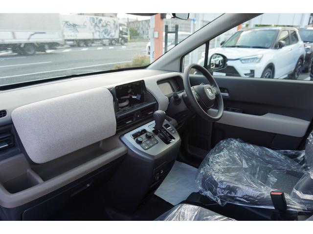 フリード e:HEVエアー 登録済未使用車 レーダークルーズコントロール 両側パワースライドドア LEDヘッドライト 横滑り防止装置 ブレーキホールド 電子パーキングブレーキ 衝突軽減ブレーキ オートエアコン(17枚目)