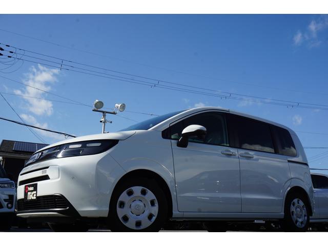 フリード e:HEVエアー 登録済未使用車 レーダークルーズコントロール 両側パワースライドドア LEDヘッドライト 横滑り防止装置 ブレーキホールド 電子パーキングブレーキ 衝突軽減ブレーキ オートエアコン(34枚目)