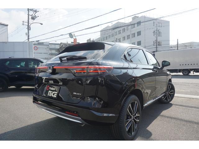 ヴェゼル ｅ：ＨＥＶ　Ｚ　登録済未使用　ホンダセンシング　パワーバックドア　ハーフレザーシート　バックカメラ　クルーズコントロール　ＬＥＤヘッドライト　ステアリングヒーター　シートヒーター　オートエアコン　禁煙車（6枚目）