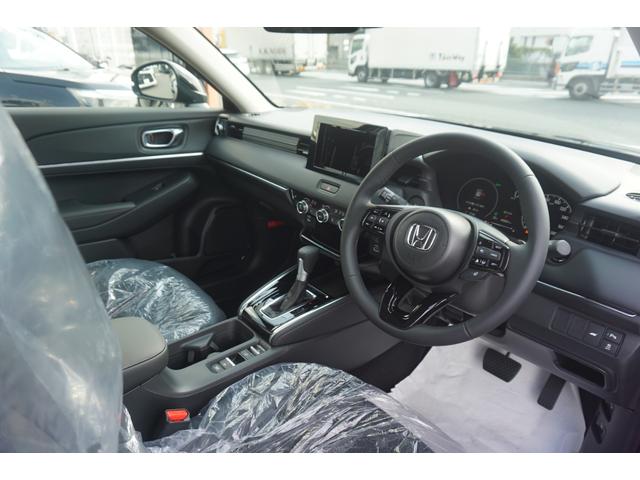 ヴェゼル ｅ：ＨＥＶ　Ｚ　登録済未使用　ホンダセンシング　パワーバックドア　ハーフレザーシート　バックカメラ　クルーズコントロール　ＬＥＤヘッドライト　ステアリングヒーター　シートヒーター　オートエアコン　禁煙車（17枚目）