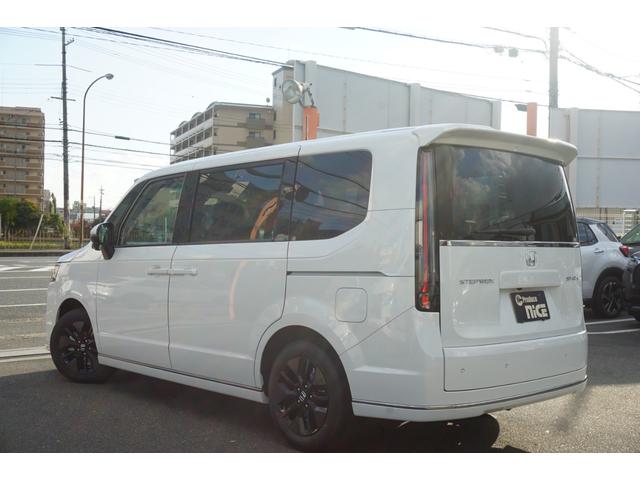 ステップワゴン スパーダ　登録済み未使用車　両側パワースライドドア　電動パワーバックドア　ＬＥＤヘッドライト　ブラインドスポットモニター　シートヒーター　オットマンシート　レーダークルーズコントロール　衝突軽減ブレーキ（7枚目）