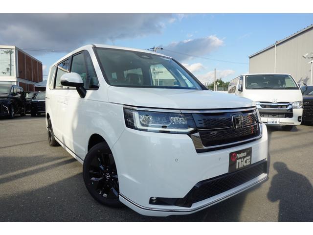 ステップワゴン スパーダ　登録済み未使用車　両側パワースライドドア　電動パワーバックドア　ＬＥＤヘッドライト　ブラインドスポットモニター　シートヒーター　オットマンシート　レーダークルーズコントロール　衝突軽減ブレーキ（8枚目）