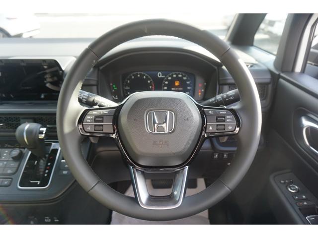 ステップワゴン スパーダ　登録済み未使用車　両側パワースライドドア　電動パワーバックドア　ＬＥＤヘッドライト　ブラインドスポットモニター　シートヒーター　オットマンシート　レーダークルーズコントロール　衝突軽減ブレーキ（30枚目）