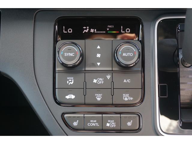 ステップワゴン スパーダ　登録済み未使用車　両側パワースライドドア　電動パワーバックドア　ＬＥＤヘッドライト　ブラインドスポットモニター　シートヒーター　オットマンシート　レーダークルーズコントロール　衝突軽減ブレーキ（53枚目）