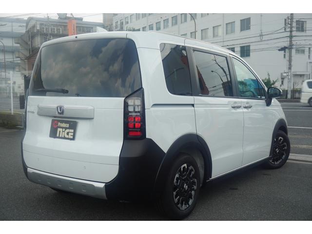 フリード クロスター 登録済未使用車 シートヒーター ブラインドスポットモニター 両側パワースライドドア LEDヘッドライト ハーフレザーシート 15インチアルミ 衝突軽減ブレーキ LEDフォグ 電動パーキングブレーキ(7枚目)