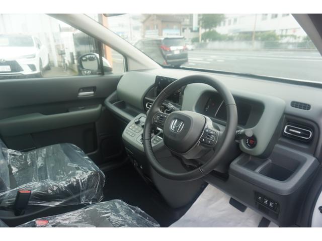 フリード クロスター 登録済未使用車 シートヒーター ブラインドスポットモニター 両側パワースライドドア LEDヘッドライト ハーフレザーシート 15インチアルミ 衝突軽減ブレーキ LEDフォグ 電動パーキングブレーキ(19枚目)