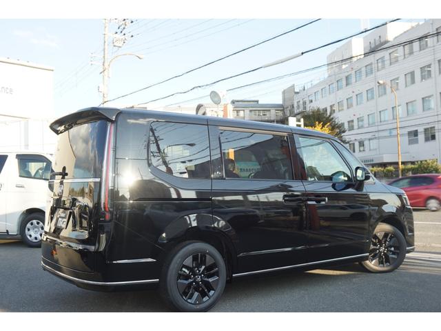 ステップワゴン ｅ：ＨＥＶスパーダ　登録済み未使用車　レーダークルーズコントロール　ブラインドスポットモニター　両側パワースライドドア　パワーバックドア　シートヒーター　ＬＥＤヘッドライト　ホンダセンシング　衝突軽減ブレーキ（10枚目）