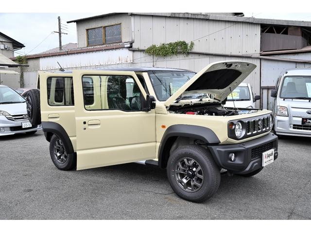 ジムニーノマド ＦＣ　登録済未使用車　スズキセイフティーサポート　パートタイム４ＷＤ　　ＯＰカラー　シフォンアイボリー／ブラック２　レーダークルーズ　禁煙車　コーナーセンサー　スマートキー　ＬＥＤヘッド　　車線逸脱警報（8枚目）