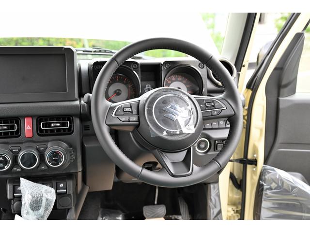 ジムニーノマド ＦＣ　登録済未使用車　スズキセイフティーサポート　パートタイム４ＷＤ　　ＯＰカラー　シフォンアイボリー／ブラック２　レーダークルーズ　禁煙車　コーナーセンサー　スマートキー　ＬＥＤヘッド　　車線逸脱警報（26枚目）
