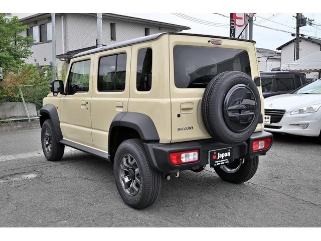 ジムニーノマド ＦＣ　登録済未使用車　スズキセイフティーサポート　パートタイム４ＷＤ　　ＯＰカラー　シフォンアイボリー／ブラック２　レーダークルーズ　禁煙車　コーナーセンサー　スマートキー　ＬＥＤヘッド　　車線逸脱警報（41枚目）