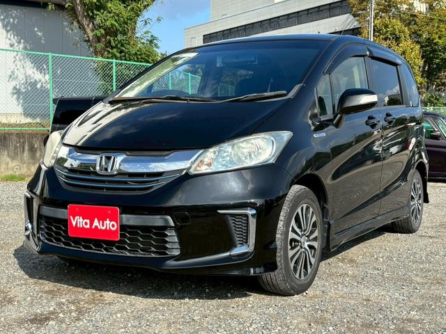 フリードハイブリッド ジャストセレクション　メモリーナビ　フルセグＴＶ　リアカメラ　スマートキー　ＨＩＤヘッドライト　両側パワスラ　Ｂｌｕｅｔｏｏｔｈ　クルコン　純正１５インチアルミ　ＥＴＣ（8枚目）