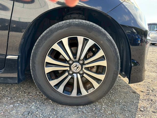 フリードハイブリッド ジャストセレクション　メモリーナビ　フルセグＴＶ　リアカメラ　スマートキー　ＨＩＤヘッドライト　両側パワスラ　Ｂｌｕｅｔｏｏｔｈ　クルコン　純正１５インチアルミ　ＥＴＣ（16枚目）