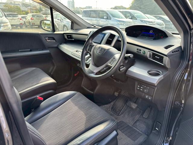 フリードハイブリッド ジャストセレクション　メモリーナビ　フルセグＴＶ　リアカメラ　スマートキー　ＨＩＤヘッドライト　両側パワスラ　Ｂｌｕｅｔｏｏｔｈ　クルコン　純正１５インチアルミ　ＥＴＣ（35枚目）