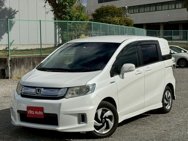 フリードスパイクハイブリッド ジャストセレクション SDナビ フルセグTV リアカメラ スマートキー HIDヘッドライト 両側パワスラ Bluetooth クルコン 純正15インチ鉄 ETC(6枚目)