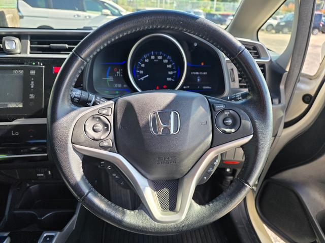 フィットハイブリッド Lパッケージ 4WD HDDナビ フルセグTV リアカメラ スマートキー LEDヘッドライト 衝突軽減ブレーキ 前ドラレコ Bluetooth クルコン 純正15インチ鉄 ETC(24枚目)