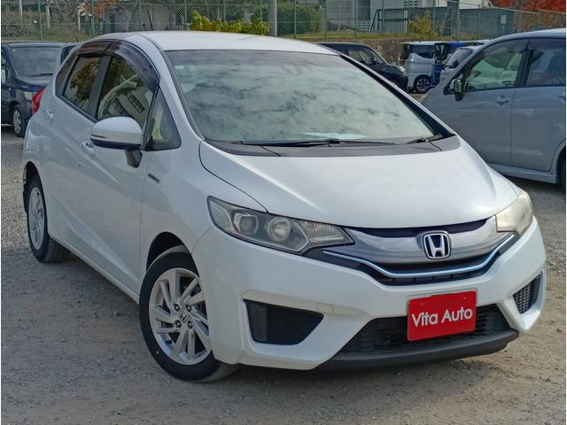 フィットハイブリッド Ｌパッケージ　メモリーナビ　フルセグＴＶ　リアカメラ　スマートキー　ＨＩＤヘッドライト　Ｂｌｕｅｔｏｏｔｈ　クルコン　純正１５インチアルミ　ＥＴＣ（2枚目）