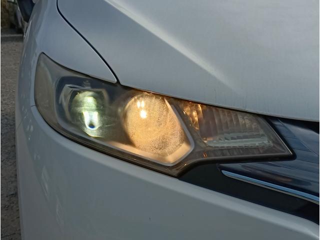 フィットハイブリッド Ｌパッケージ　メモリーナビ　フルセグＴＶ　リアカメラ　スマートキー　ＨＩＤヘッドライト　Ｂｌｕｅｔｏｏｔｈ　クルコン　純正１５インチアルミ　ＥＴＣ（17枚目）