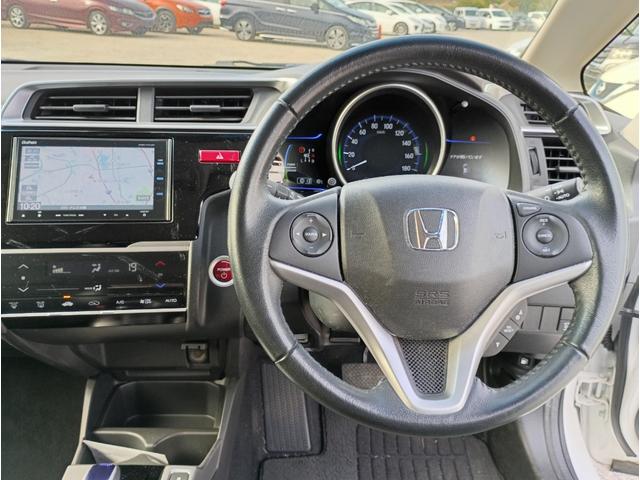 フィットハイブリッド Ｌパッケージ　メモリーナビ　フルセグＴＶ　リアカメラ　スマートキー　ＨＩＤヘッドライト　Ｂｌｕｅｔｏｏｔｈ　クルコン　純正１５インチアルミ　ＥＴＣ（18枚目）