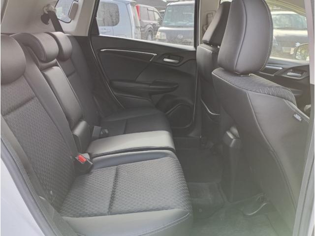 フィットハイブリッド Ｌパッケージ　メモリーナビ　フルセグＴＶ　リアカメラ　スマートキー　ＨＩＤヘッドライト　Ｂｌｕｅｔｏｏｔｈ　クルコン　純正１５インチアルミ　ＥＴＣ（43枚目）