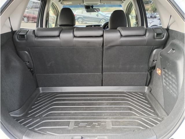 フィットハイブリッド Ｌパッケージ　メモリーナビ　フルセグＴＶ　リアカメラ　スマートキー　ＨＩＤヘッドライト　Ｂｌｕｅｔｏｏｔｈ　クルコン　純正１５インチアルミ　ＥＴＣ（45枚目）