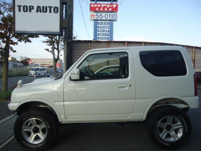 ジムニー クロスアドベンチャーXC 5速MT 4WD ワンオーナー シートヒーター キーレス ETC ハーフレザーシート 背面タイヤ 社外ステンレスマフラー 前後FRPバンパー(5枚目)