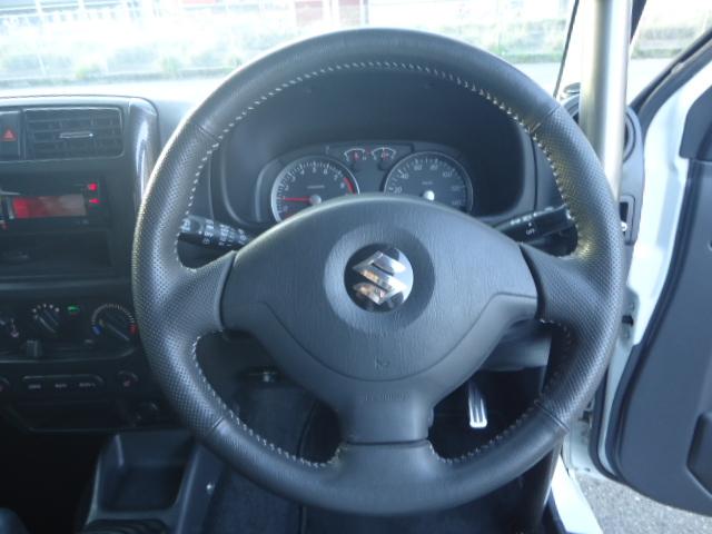 ジムニー クロスアドベンチャーXC 5速MT 4WD ワンオーナー シートヒーター キーレス ETC ハーフレザーシート 背面タイヤ 社外ステンレスマフラー 前後FRPバンパー(28枚目)