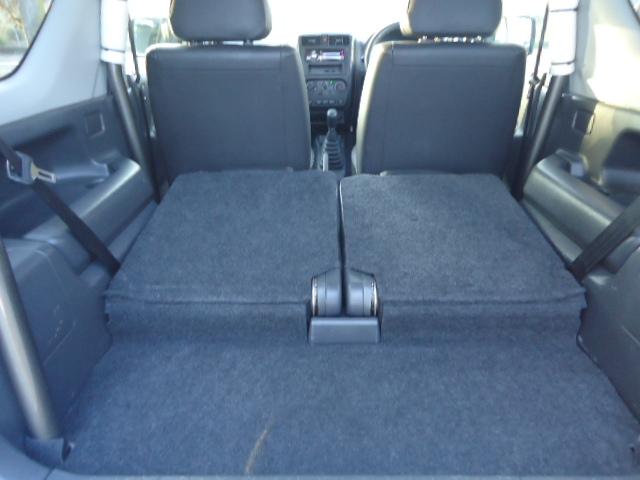 ジムニー クロスアドベンチャーXC 5速MT 4WD ワンオーナー シートヒーター キーレス ETC ハーフレザーシート 背面タイヤ 社外ステンレスマフラー 前後FRPバンパー(35枚目)